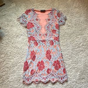 Multicolored lace dress with mesh detailing; size medium from Fabrik